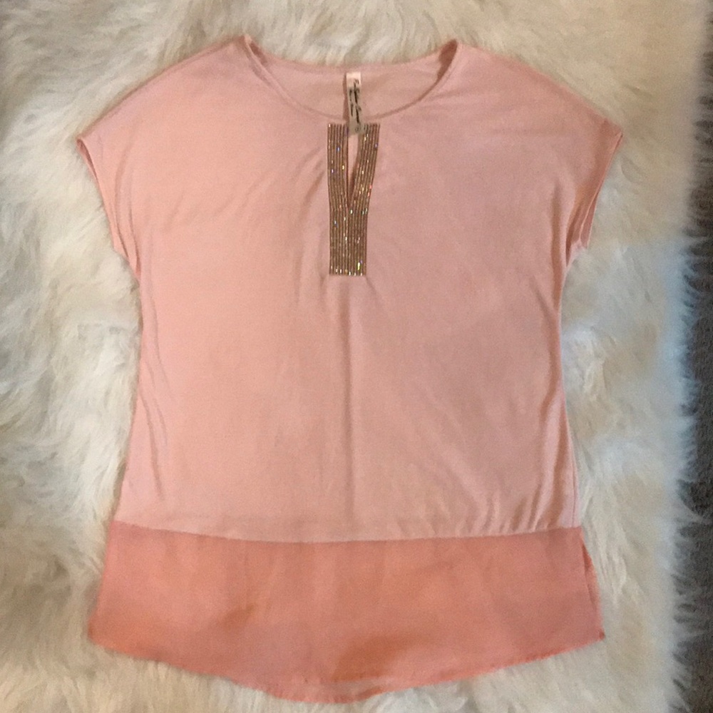 Pink polyester/spandex blouse